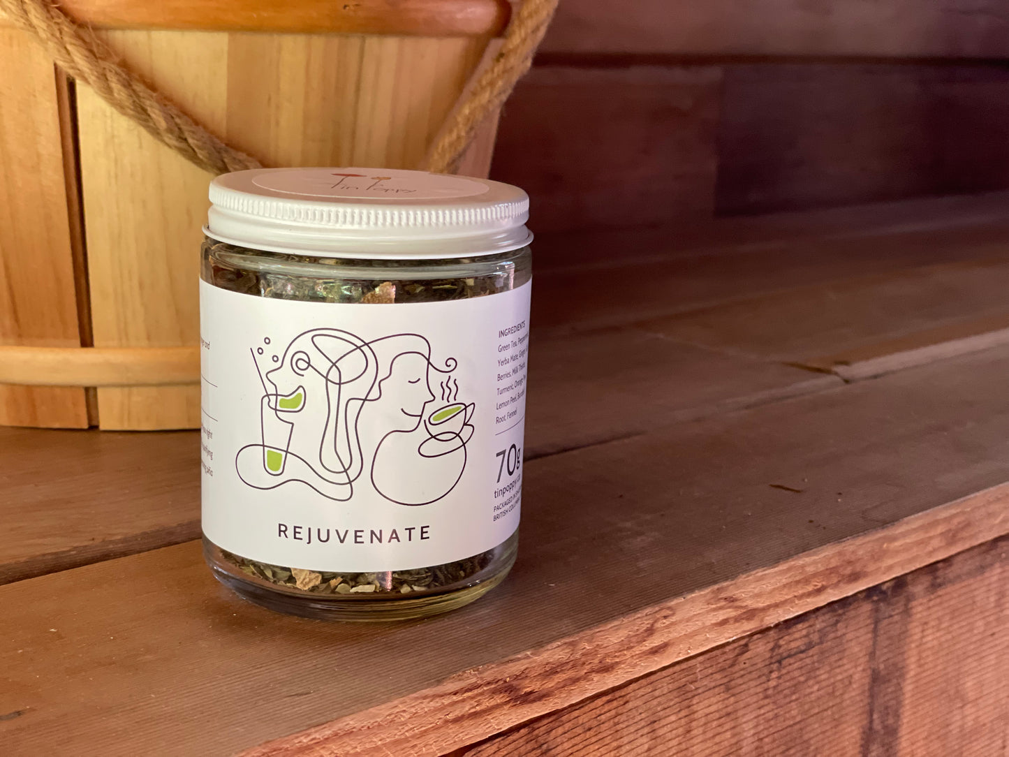A jar of Rejuvenate Tea from Tin Poppy Retreat