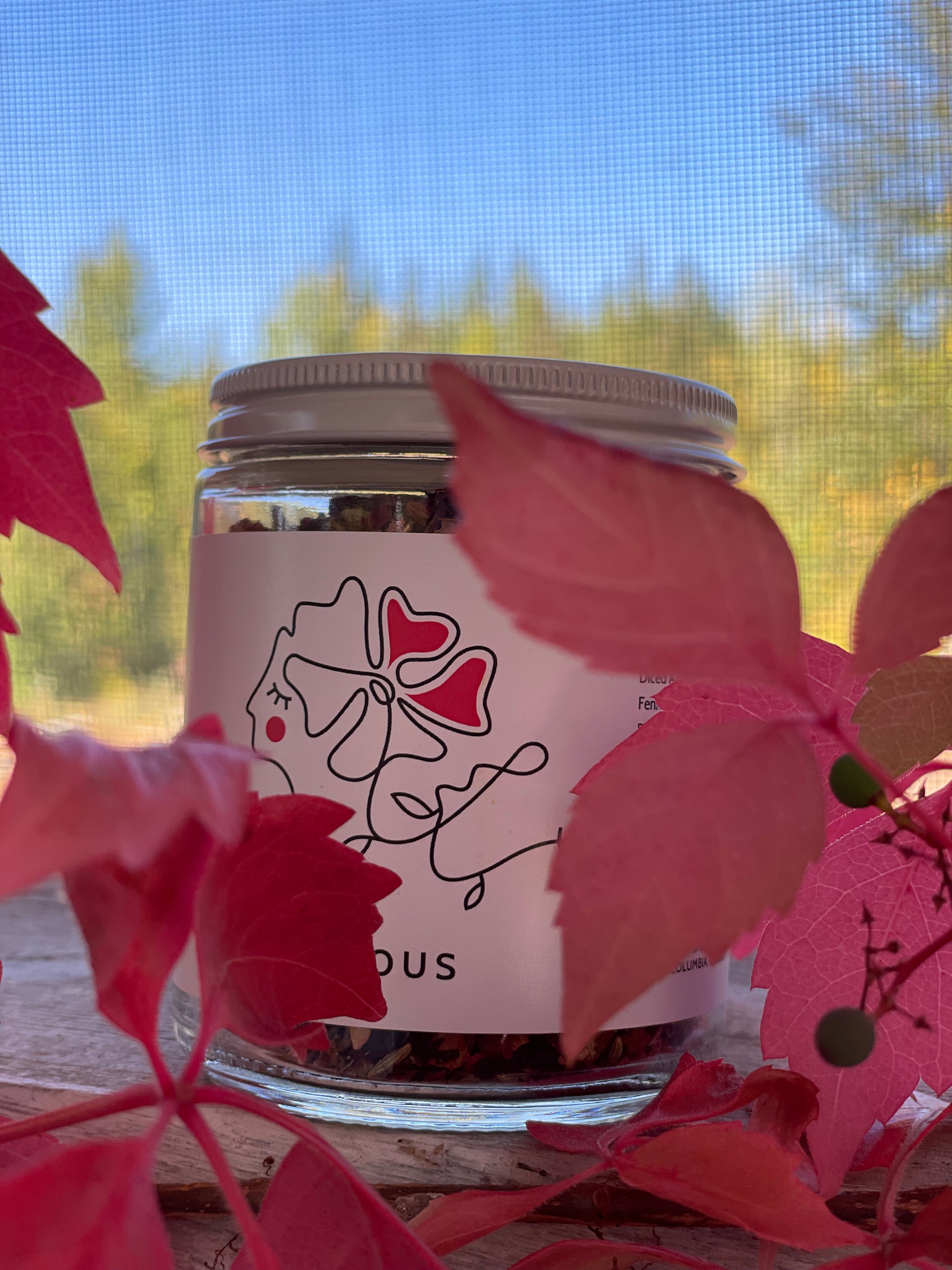a jar of amorous tea blend from tin poppy retreat